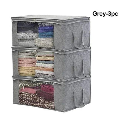 3x Clothes Storage Box with transparent sections filled with folded clothes on a white background