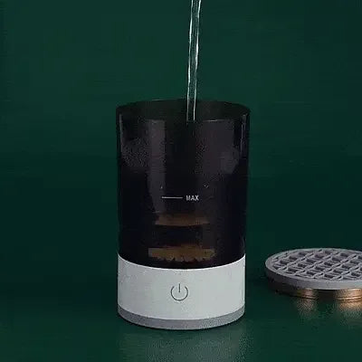 Automatic Electric Makeup Brush Cleaner pouring water for hygienic brush cleaning.