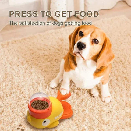 Dog enjoying the Automatic Interactive Pet Feeder while playing for food.