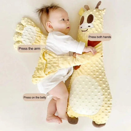 Baby in a yellow Baby Pat Pillow Gentle Soothing Sleep Companion for Babies & Toddlers with instructions on how to interact with it.
