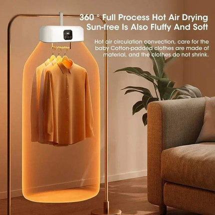 Electric Travel Clothes Dryer with a shirt inside, placed in a room with a couch and plant.