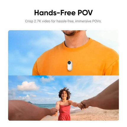 Person wearing an Insta360 NEW GO 3 Tiny Action Camera on their chest with a beach scene in the background