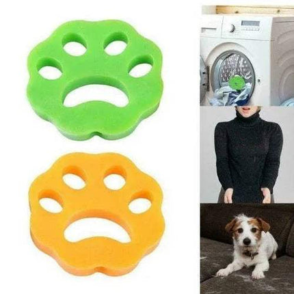 Two green and orange paw-shaped Pet Hair Remover Effortlessly Remove Fur from Clothes & Fabrics with a person and a dog in the background.