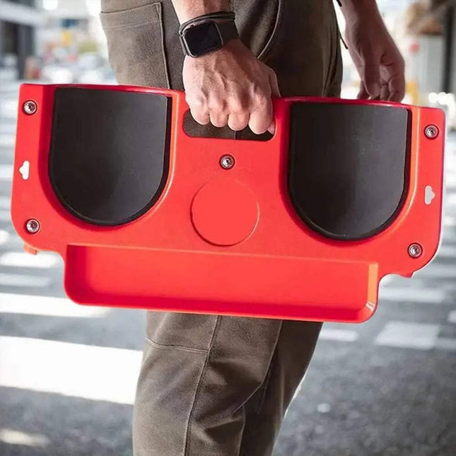Person carrying a red and black  Rolling Knee Pads with Wheels 