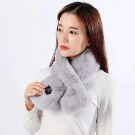 Woman Electric Heated Scarf Fast & Cozy Warmth for Winter Outdoors a gray scarf with a white background