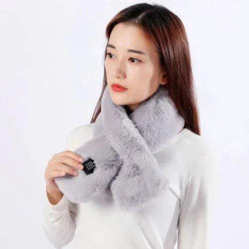 Woman Electric Heated Scarf Fast & Cozy Warmth for Winter Outdoors a gray scarf with a white background