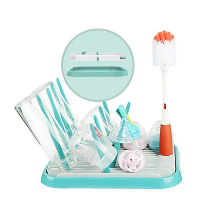 Green Baby Bottle Drying Rack Hygienic Storage & Fast Drying Organizer with various baby items on a white background