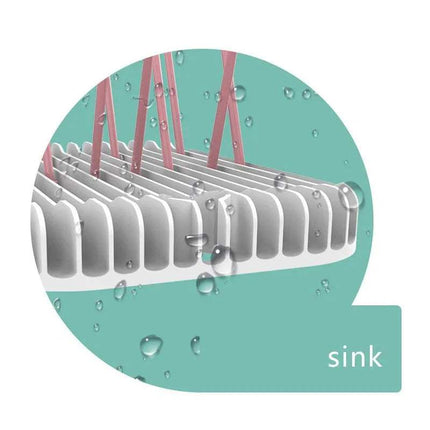 closed-up photo of a Baby Bottle Drying Rack Hygienic Storage & Fast Drying Organizer with water droplets on a teal background