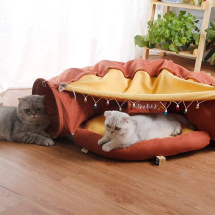 Two cats playing with Pet Cats Tunnel Toy on a wooden floor.
