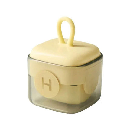 Portable Fur Remover with a yellow lid featuring a logo on a white background