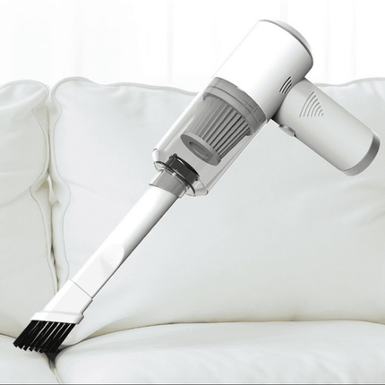 Handheld Vacuum Mite Remover in use on a sofa, designed for deep allergen cleaning.
