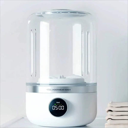 Portable Mini Washing Machine with digital display on a light gray background