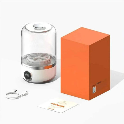 Portable Mini Washing Machine with clear dome lid, orange box, white cable, and paper on a white background