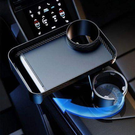 Multifunctional Car Cup Holder with Tray with phone stand and cup holder in a vehicle interior.
