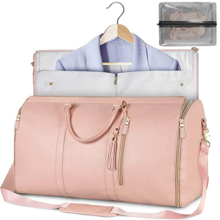 Women Large PU Folding Suit Storage Bag pink with clothes and a clear pouch on a white background