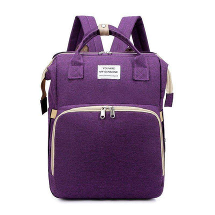 Dark Purple Baby Diaper Backpack with beige accents on a white background