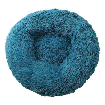 Comfortable Donut Bed for Pets in teal color, ultra-soft and cozy pet bed for cats and small dogs.