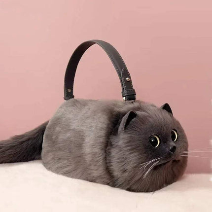 Ultra-Soft Convertible Cat Handbag Stylish & Playful Feline-Inspired Bag with a pink background
