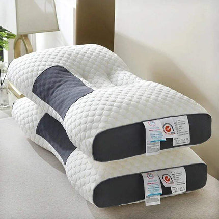 Super Ergonomic Sleep Neck Pillow stacked on a nightstand, showcasing its unique contoured design for optimal neck support.