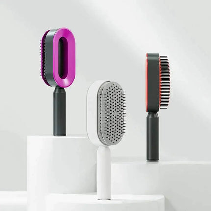 Three Ergonomic Hair Brush with different bristle designs on a white background