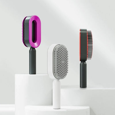 Three grooming brushes with different bristle designs on a white background