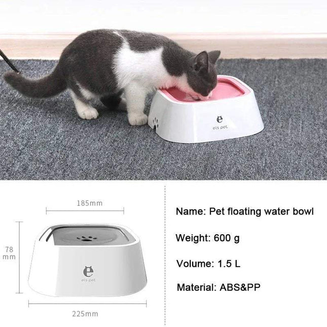 Cat drinking from a Pet Floating Bowl on a textured surface