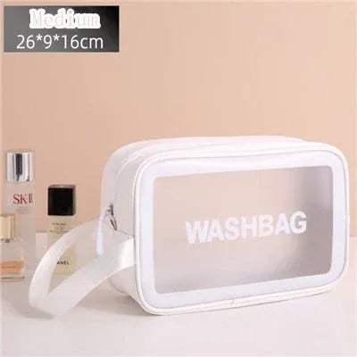 White Portable Transparent Waterproof Travel Wash & Makeup Bag with 'WASHBAG' text on a beige background