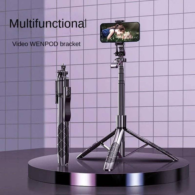 L16 Selfie Stick & Tripod Compact Bluetooth Photography Companion with smartphone holder on a reflective surface against a tiled wall background.
