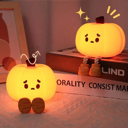 Cute Pumpkin Night Light on a surface with a blurred background